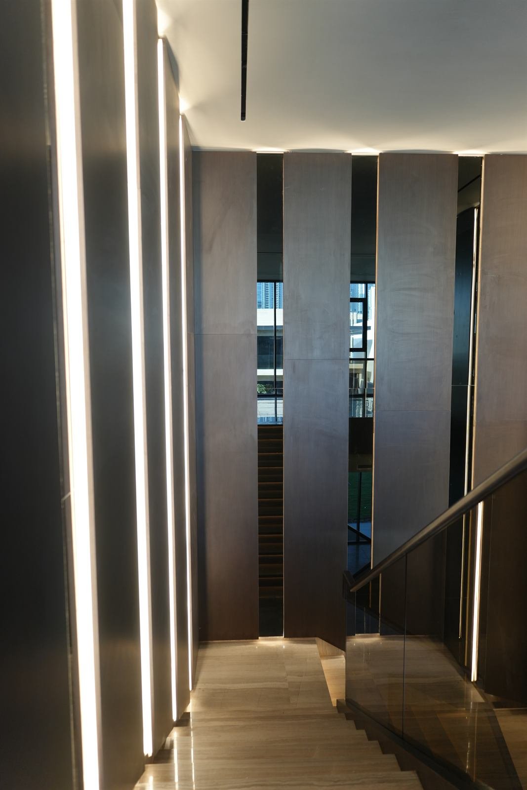 Elevator lobby stone and wood cladding, commercial project