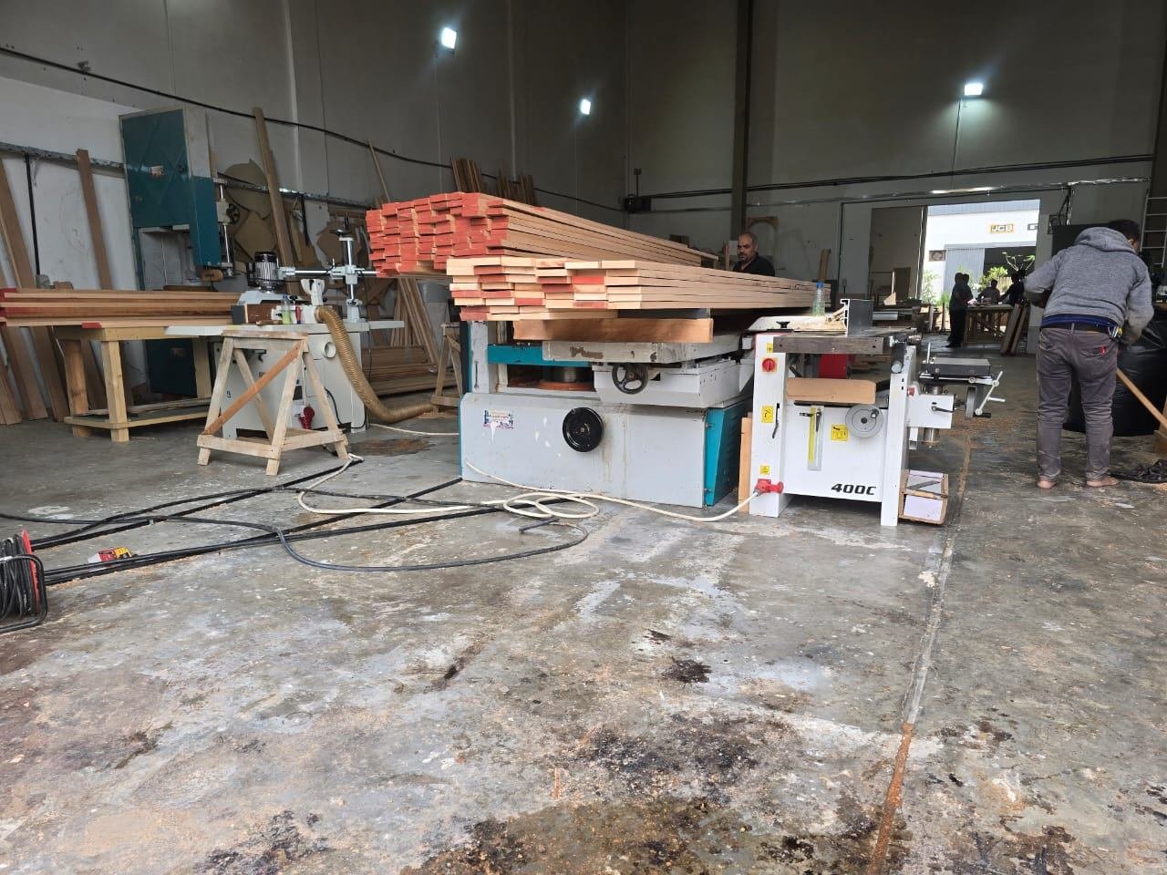 Woodworking machinery preparing timber at the factory