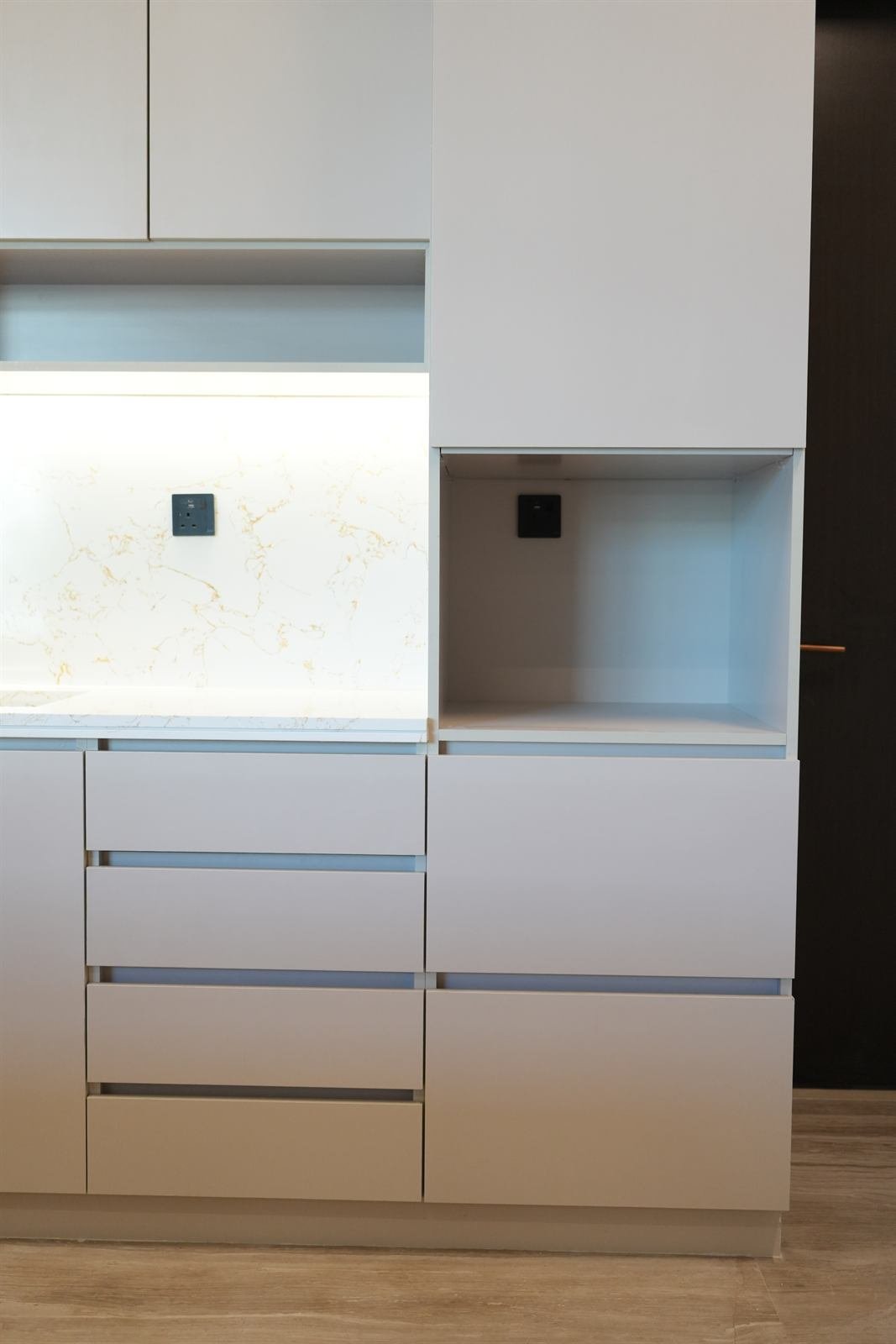 Detail of modern kitchen cabinet doors and hardware