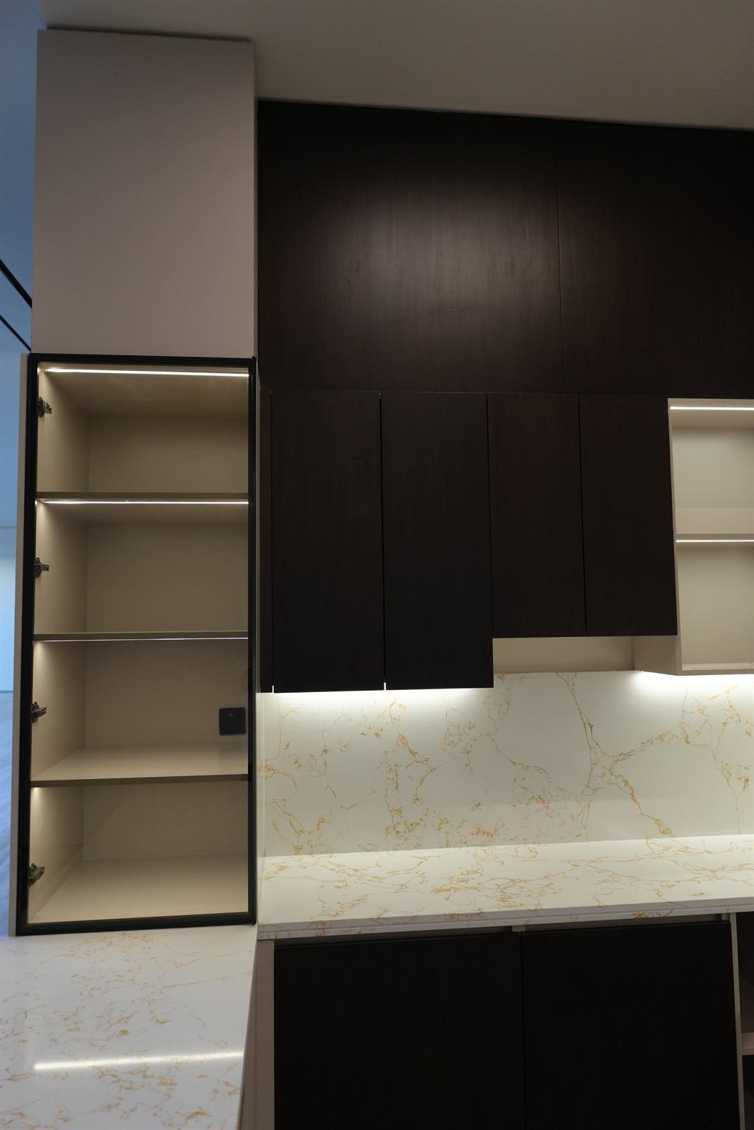 Kitchen storage drawers and marble countertop detail