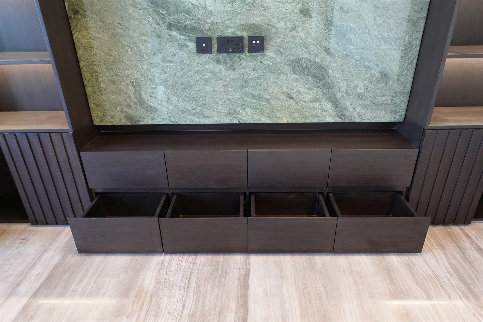 TV feature wall unit with natural stone and wood cladding